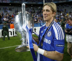 Torres of Chelsea celebrates with the UEFA Champions League trophy after winning the final soccer match against Bayern Munich at the Allianz Arena in Munich